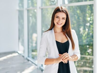 A woman wearing a stylish Zoom interview attire.