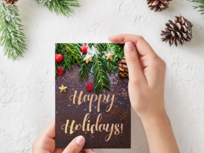Someone who makes Christmas cards for co-workers.