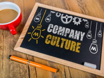 A board that reminds office workers how company culture is essential.