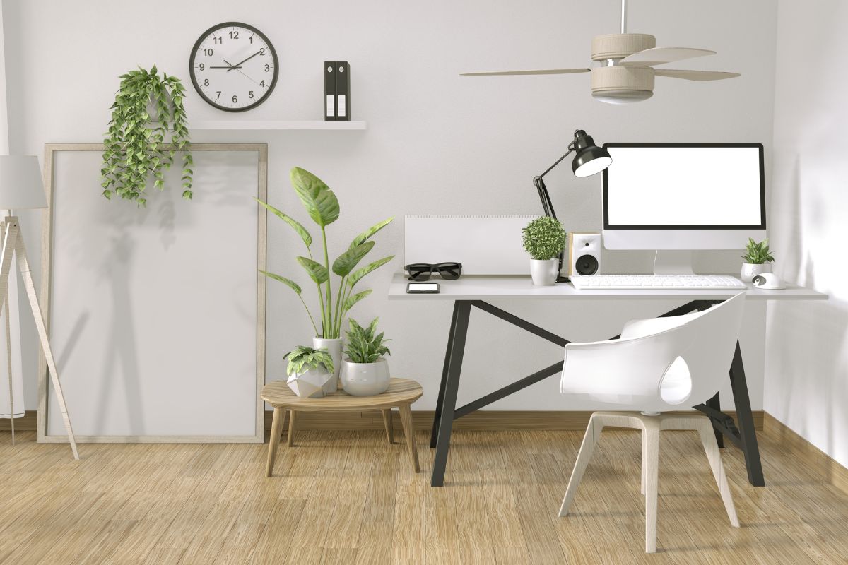 An office corner interior featuring a desk chair with no wheels